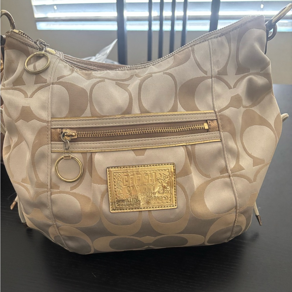 Coach Poppy drawstring Signature Beige and Tan Shoulder Bag